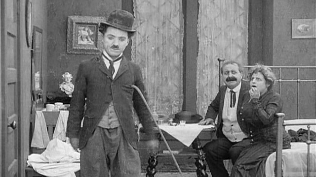 Застигнутый дождем (Чарли Чаплин).