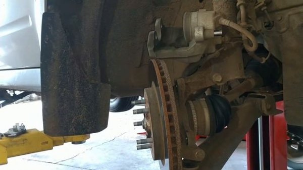 Front brake pad replacement 2010 Mazda Tribute how to change front brakes