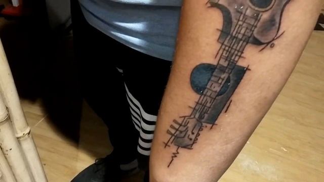 Guitar Tattoo ; a perfect tattoo for Music Lovers смотреть онлайн