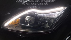 Тюнинг Ford Focus 2 в студии светостайлинга ALFA-CAR накладные ДХО внутрь фары