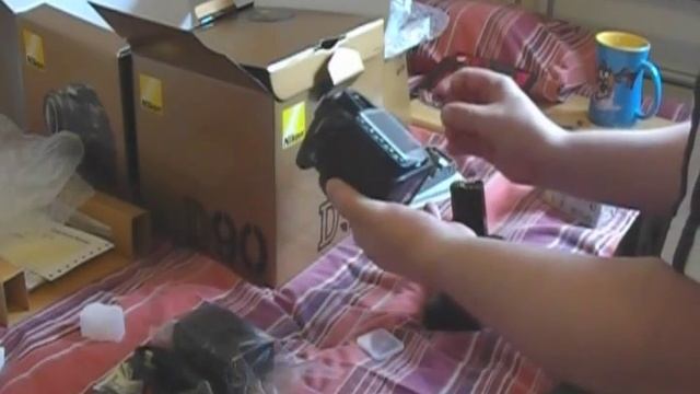 Nikon D90 18-55 MB-D80 ML-L3 Unboxing.wmv смотреть онлайн