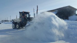 На расчистке снега.Автогрейдер ГС18.05