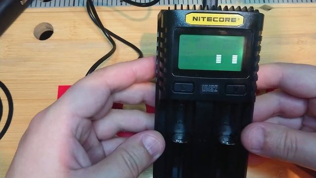 Универсальные зарядные устройства Nitecore UMS2, Nitecore i4. смотреть онлайн