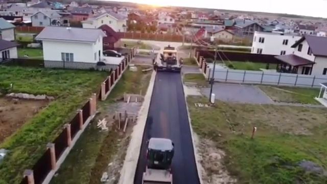 Укладка асфальта на улице Вишневая в коттеджном посёлке Малиновые вечера