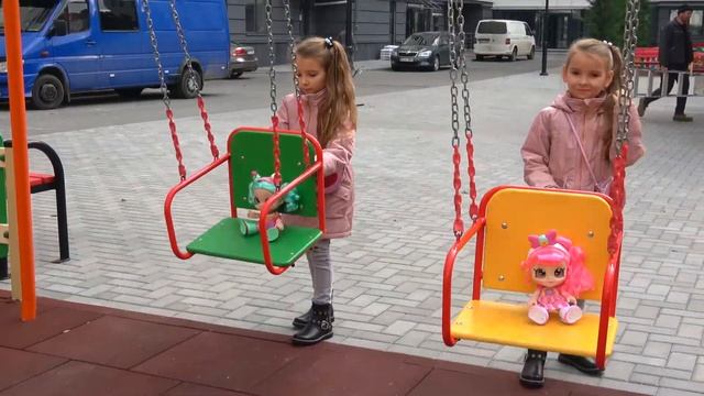 Funny Xenia and Arina playing with baby dolls on the playground and at the swimming pool смотреть онлайн