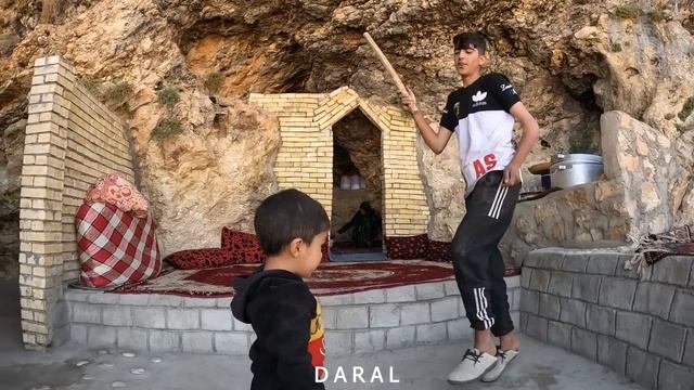 "Amir and His Family's Stone Wall Transformation in Their Backyard Cave Home" смотреть онлайн