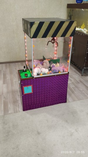 Игровой автомат с игрушками  хватайка своими руками