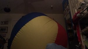 Playing on big beach ball