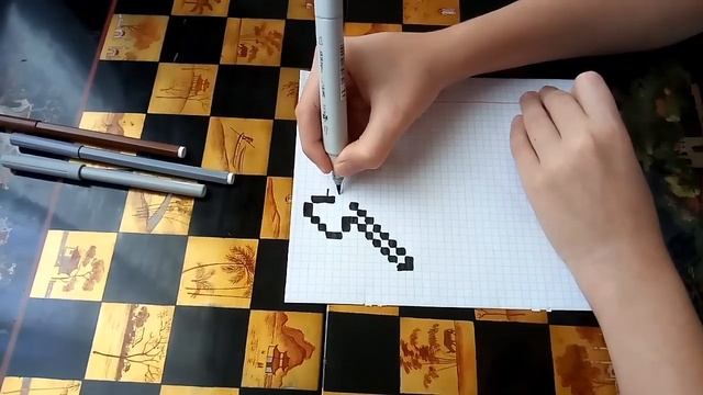 Незеритовый топор по клеточкам из Майнкрафта