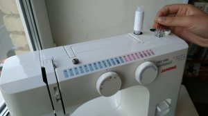 Как намотать нитку на шпульку на швейной машины janome 743 - 03.