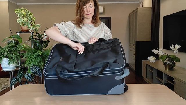 Дорожная сумка на колесах Polar П7123 (черная)Дорожная сумка на колесах Polar П7123 (черная) смотреть онлайн