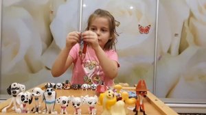 101 далматинец мультсериал . распаковка пакетов с сюрпризом.  улица далматинцев. Попрыгунчики
