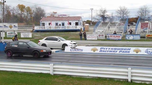 2011 Stock Subaru WRX 13.1 @ 103.73 - 1/4 Mile vs. Honda Civic Hatch смотреть онлайн