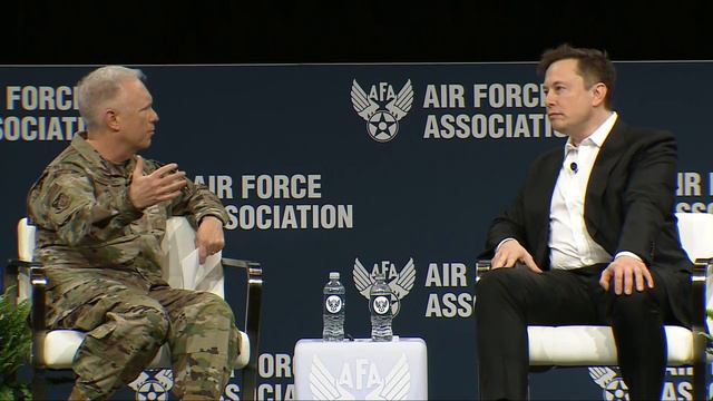 Elon Musk And Lt Gen John F. Thompson