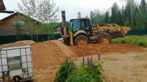 Планировка участка экскаватором-погрузчиком CAT 434F