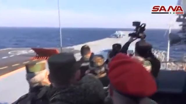 Сирийское ТВ освещает визит сирийских военных на авианосец Адмирал Кузнецов и Крейсер Петр Великий смотреть онлайн