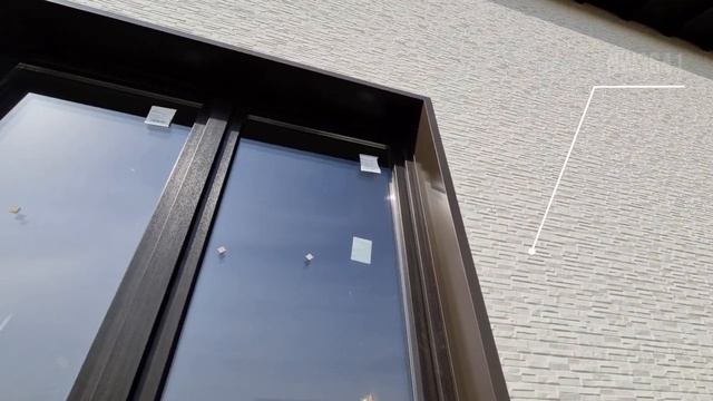 Облицовка каркасного дома фиброцементными панелями KMEW под камень и под дерево