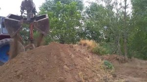 ЮМЗ грейфер работает