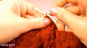 Вязаная безрукавка спицами