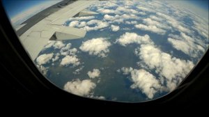 Обалденный вид из иллюминатора самолёта