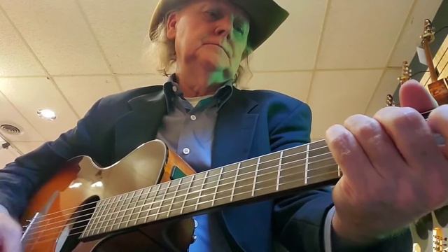 Strumming a Yamaha NTX1, solid spruce top and pickup with a bit of JJ Cale's "Magnolia" смотреть онлайн