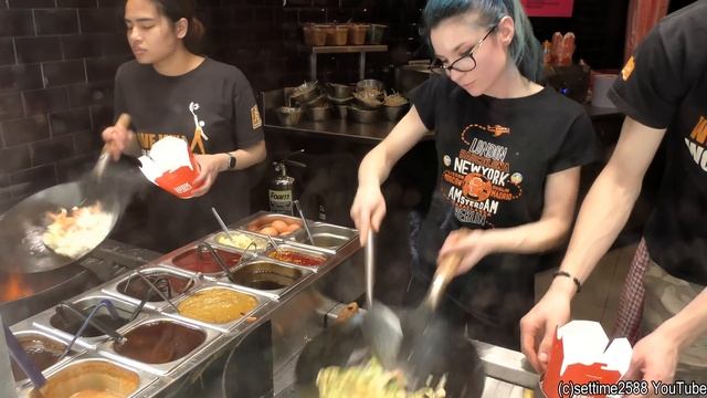 Cooking With The Asian Wok. Street Food Of London