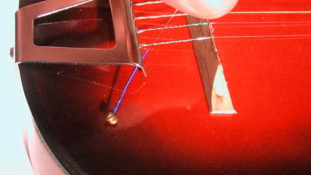 Fixing a String on Your Woodstock Kid's Fantasy Guitar смотреть онлайн