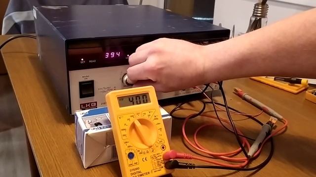 Test digital multimeter DT830D range 1000V DC with HV DC power supply. смотреть онлайн