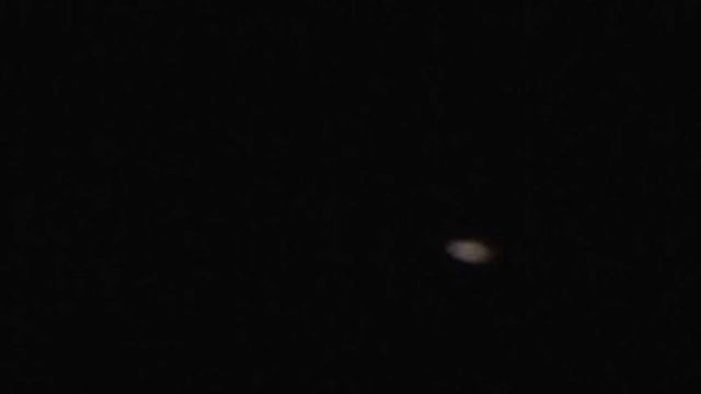 Saturn viewed through a 70/900mm telescope смотреть онлайн