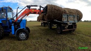 Вывозим сено по новому. Трактор МТЗ-82. 26 рулонов за раз и это не предел!!!