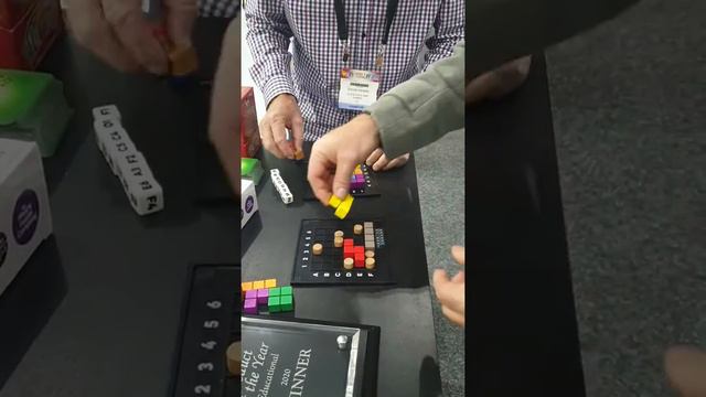 Genius Square by the happy puzzle company