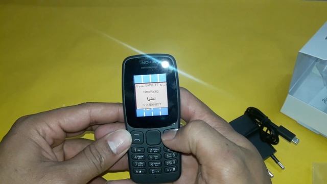 فتح علبة ومراجعة هاتف نوكيا Nokia 106