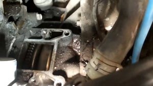 Как снять стартер на Ford Escape?