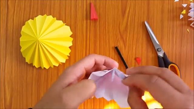 How to make a paper umbrella that open and closes- Step by step process.