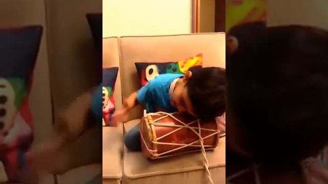 Amazing 3 year old playing the dholak and singing смотреть онлайн