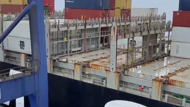 Container Ship. Cargo Ship At The Seaport. Transportation Of Goods By Containers. IEC.