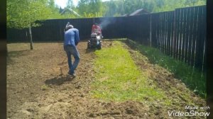 Вспахать землю по цене 1800 рублей за сотку