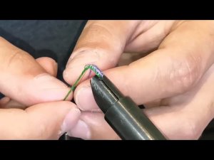 Плетёная или вязаная муха на хариуса