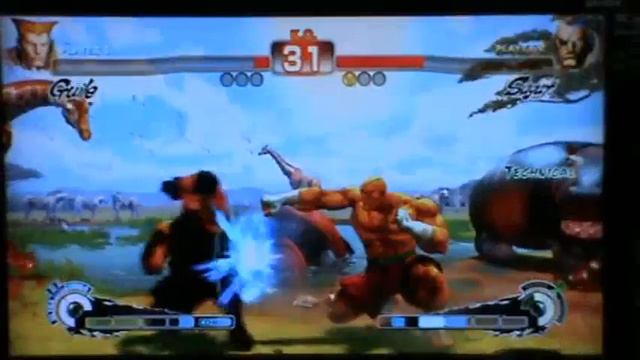 SSF4 Rambus (Sagat) vs Satit_fighter (Guile) @KZ Garden#2 Thailand смотреть онлайн