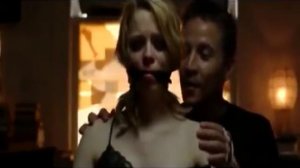 Emily Somers gagged and tied to a chair