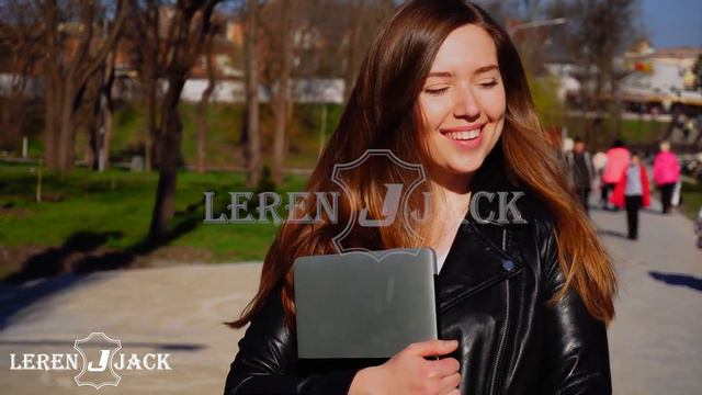 A Young Woman Dressed in a Black Leather Jacket | By LerenJack смотреть онлайн