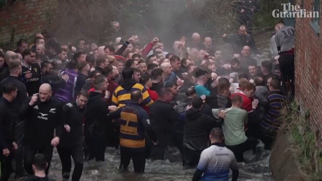 Thousands gather for annual Royal Shrovetide Football game смотреть онлайн