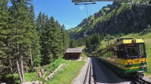 По горным серпантинам, на трамвайчике, с восточной скалы Лаутербруннена, съезжаем разворотом в горе!