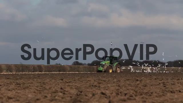 General view of a local farmer ploughing the fields aroun... смотреть онлайн