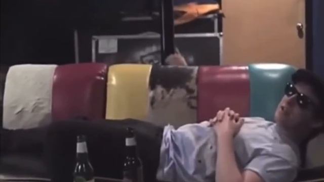 jamie cook sliding down a pole while matt helders lies on a couch смотреть онлайн