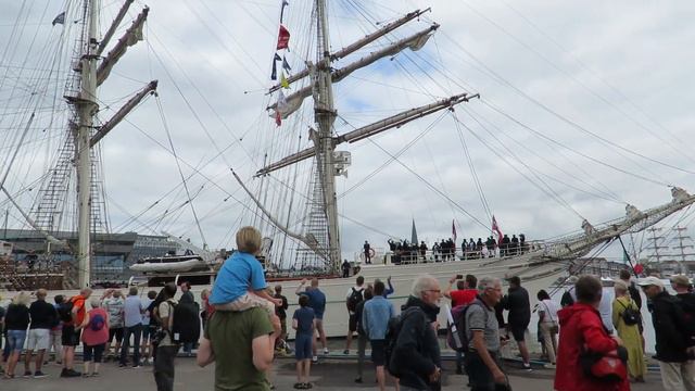 Shabab Oman II Leaving Port While Playing Music