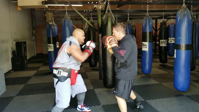 Southpaw boxing club owner Eric Asher working with me. смотреть онлайн