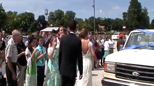 Corinne and Cameron Meyer exiting church