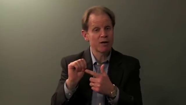 Dr Daniel Siegel Presenting A Hand Model Of The Brain