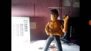 Брюс Ли из пластилина исполняет нунчаками